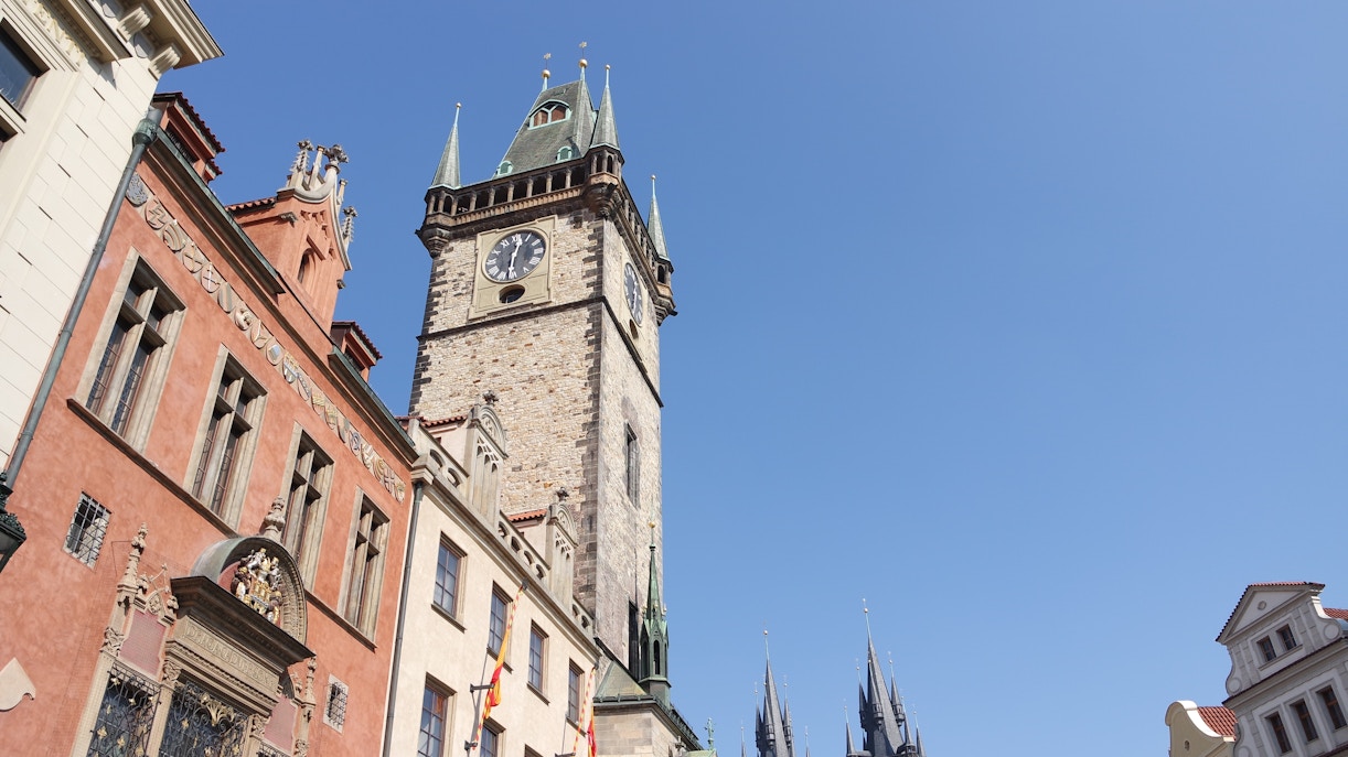 Old Town Hall Tower in Prague with surrounding historic buildings.