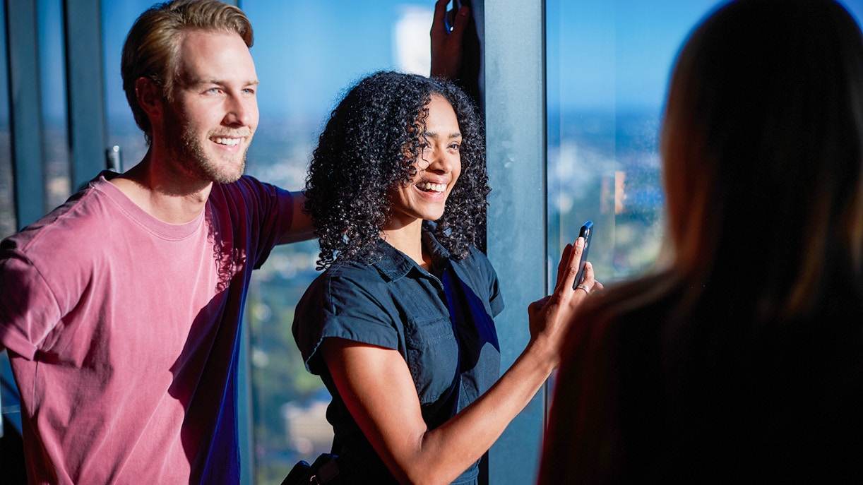 Visitors enjoying the view from Melbourne Skydeck at Eureka Tower.
