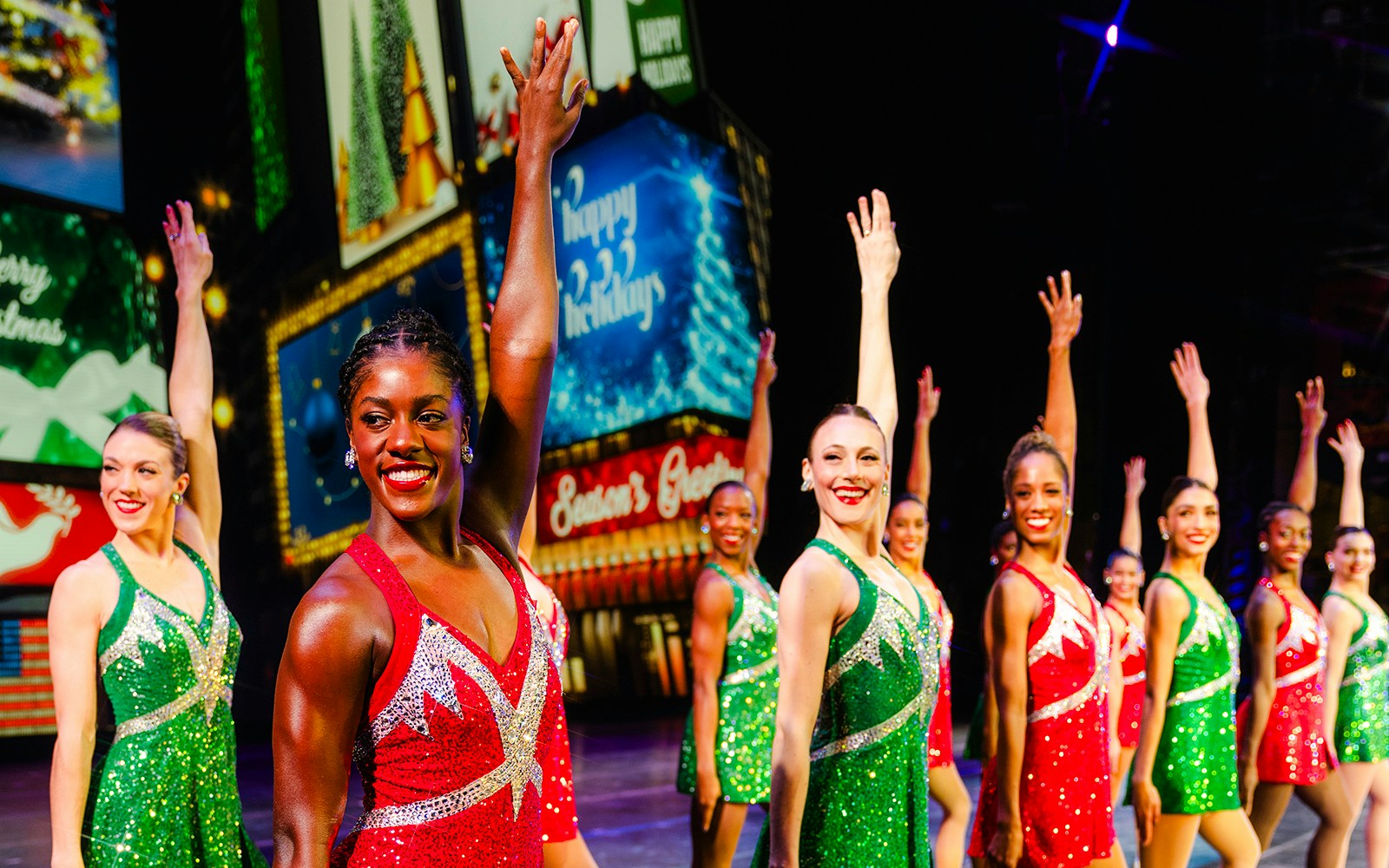 Radio City Rockettes performing in festive costumes at the Christmas Spectacular by QVC.