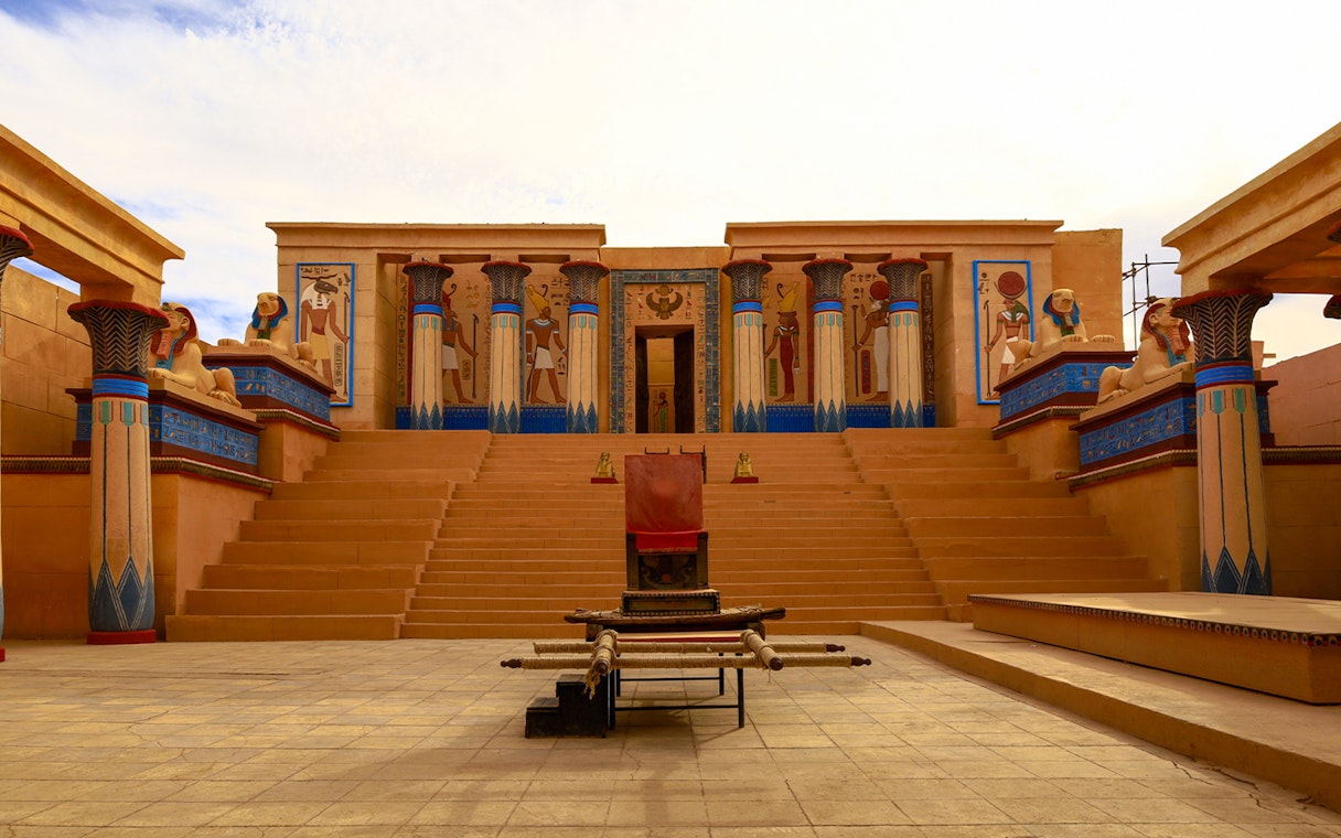 Ancient Egyptian set at Atlas Studios in Ouarzazate, Morocco, featuring columns and statues.