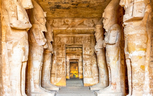 Abu Simbel Temple interior with ancient statues and hieroglyphics, Egypt.