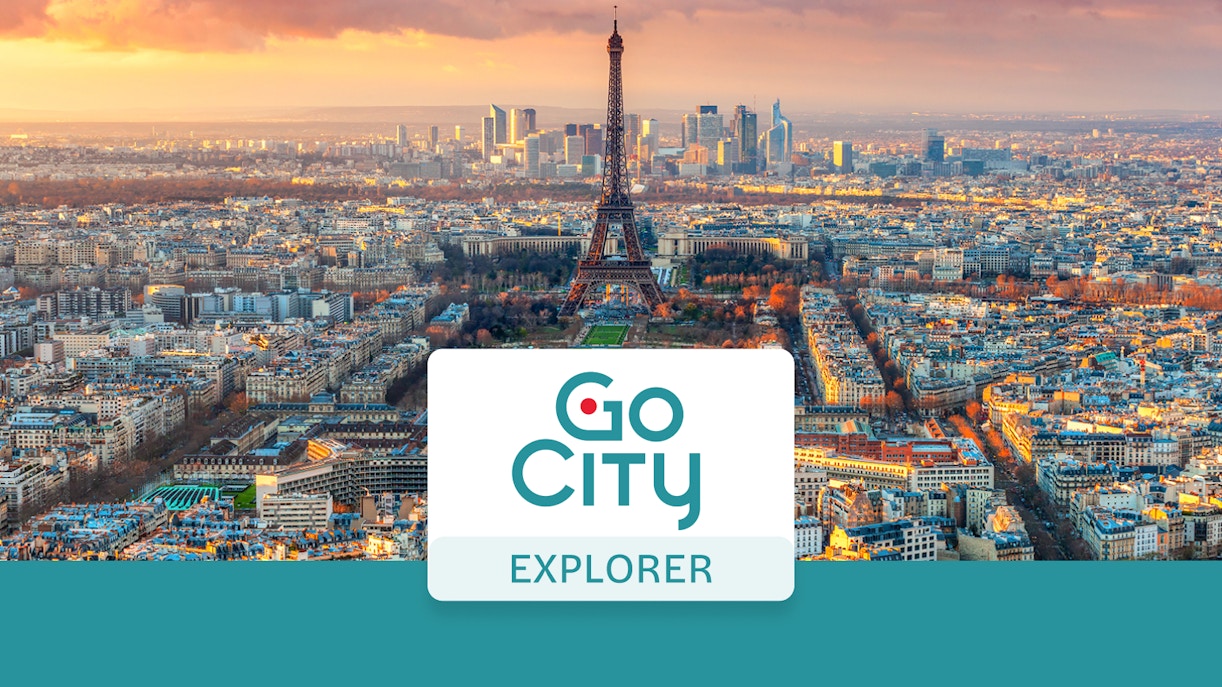 Eiffel Tower view over Paris skyline at sunset, promoting Go City Explorer Pass.