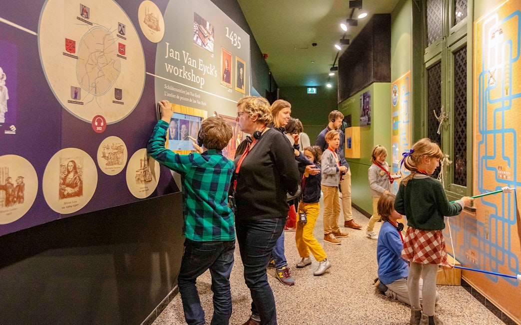 Guests exploring interactive exhibits at Historium Bruges.