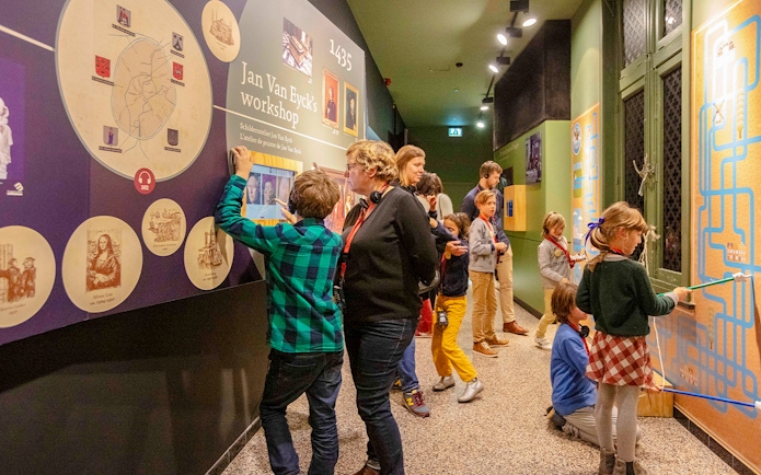 Guests exploring interactive exhibits at Historium Bruges.
