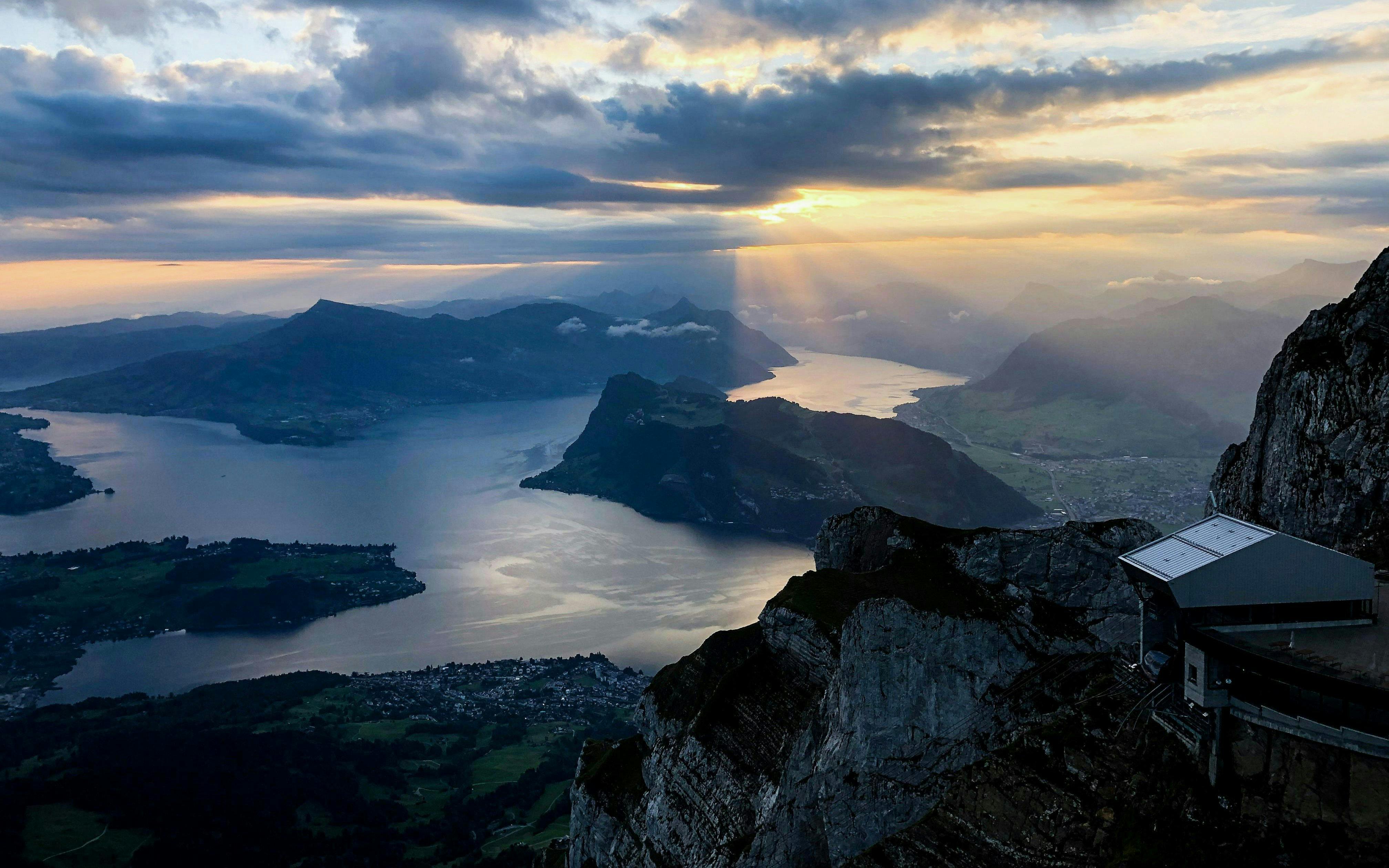 Panoramic view of Mount Pilatus with Lake Lucerne at sunset, Switzerland.