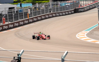 Race car on Monaco Formula 1 track during walking tour.