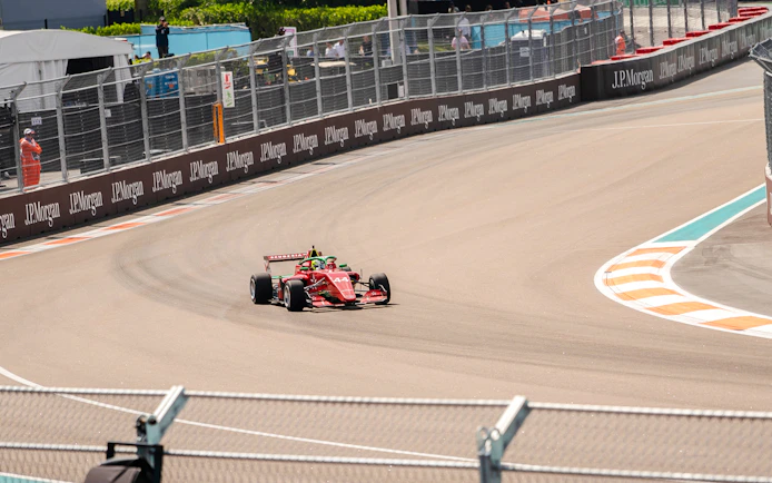 Race car on Monaco Formula 1 track during walking tour.
