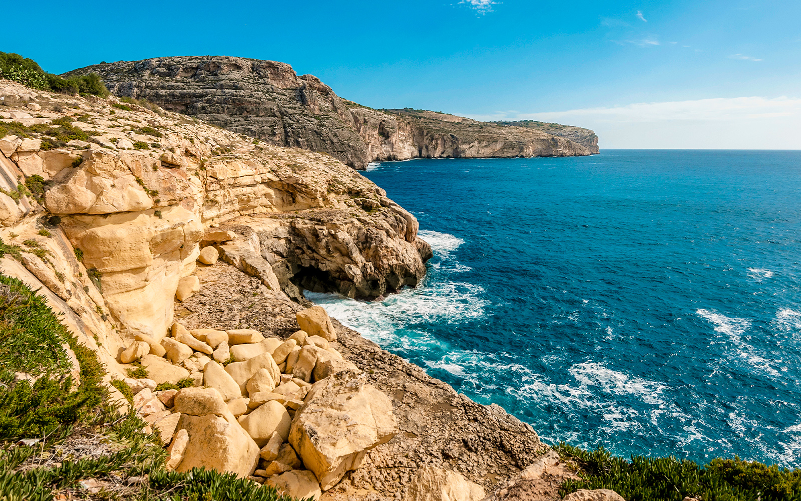 Dingli Cliffs coastline view in Malta with the Mediterranean Sea in the background.