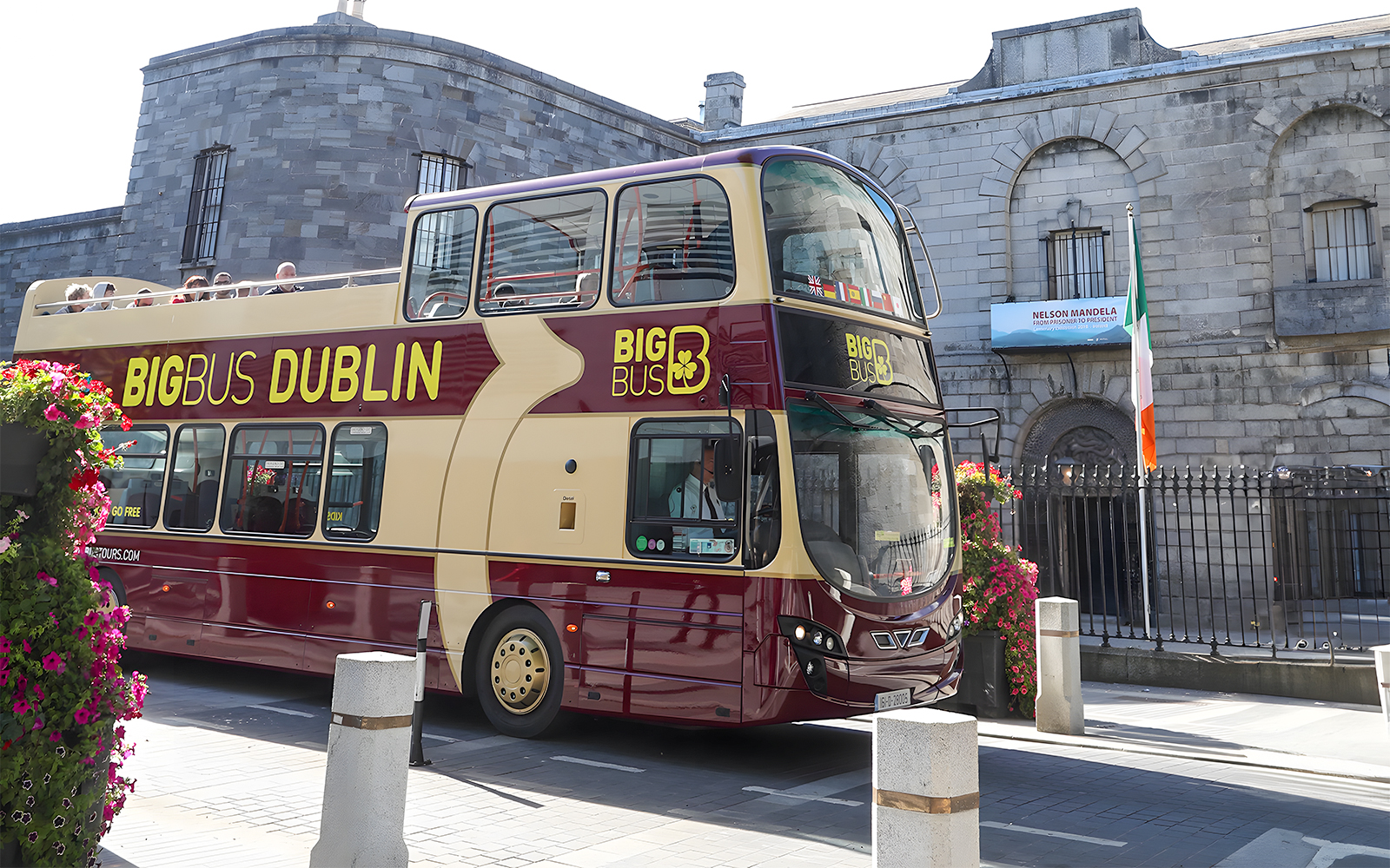 Double-decker tour bus in front of Kilmainham Gaol, Dublin.
