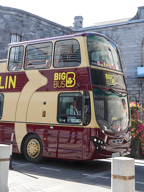 Double-decker tour bus in front of Kilmainham Gaol, Dublin.