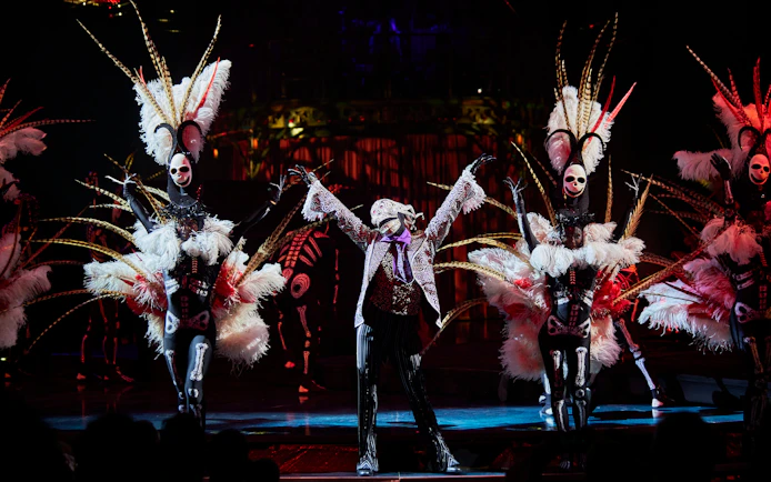 Kooza Brisbane show performers in elaborate costumes on stage.