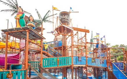 Visitors enjoying water rides at Wild Wadi Water Park, Dubai.