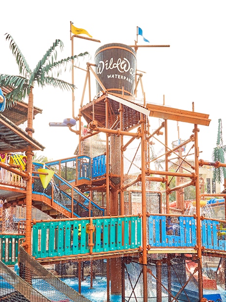Visitors enjoying water rides at Wild Wadi Water Park, Dubai.