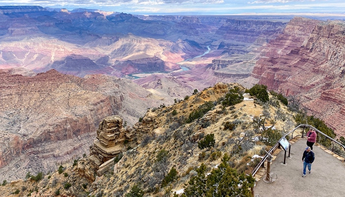 Tourists enjoying a scenic view from the Grand Canyon South Rim Bus tour in Las Vegas