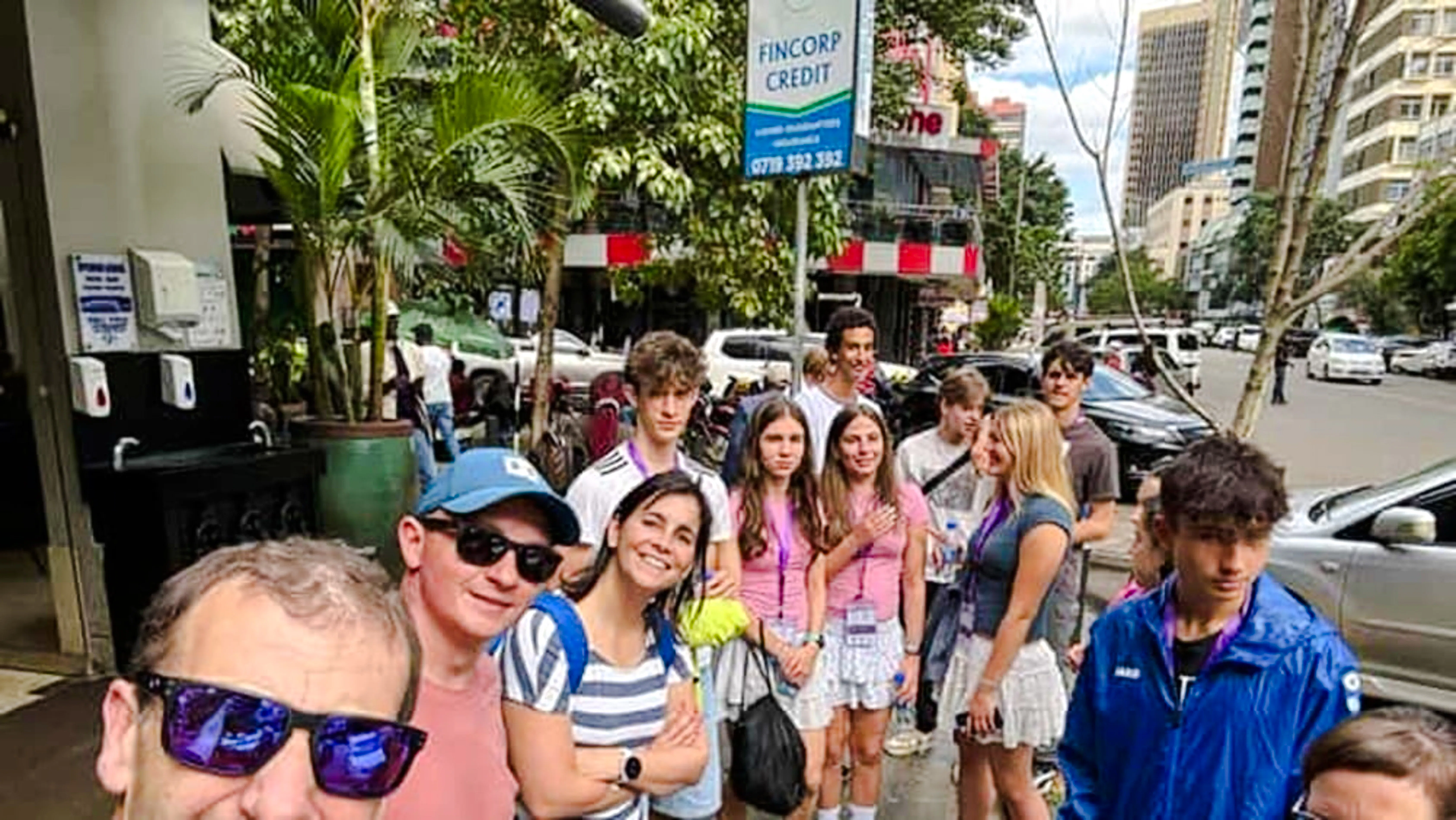 Group of tourists on a guided walking tour in Nairobi city center.