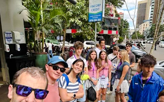 Group of tourists on a guided walking tour in Nairobi city center.
