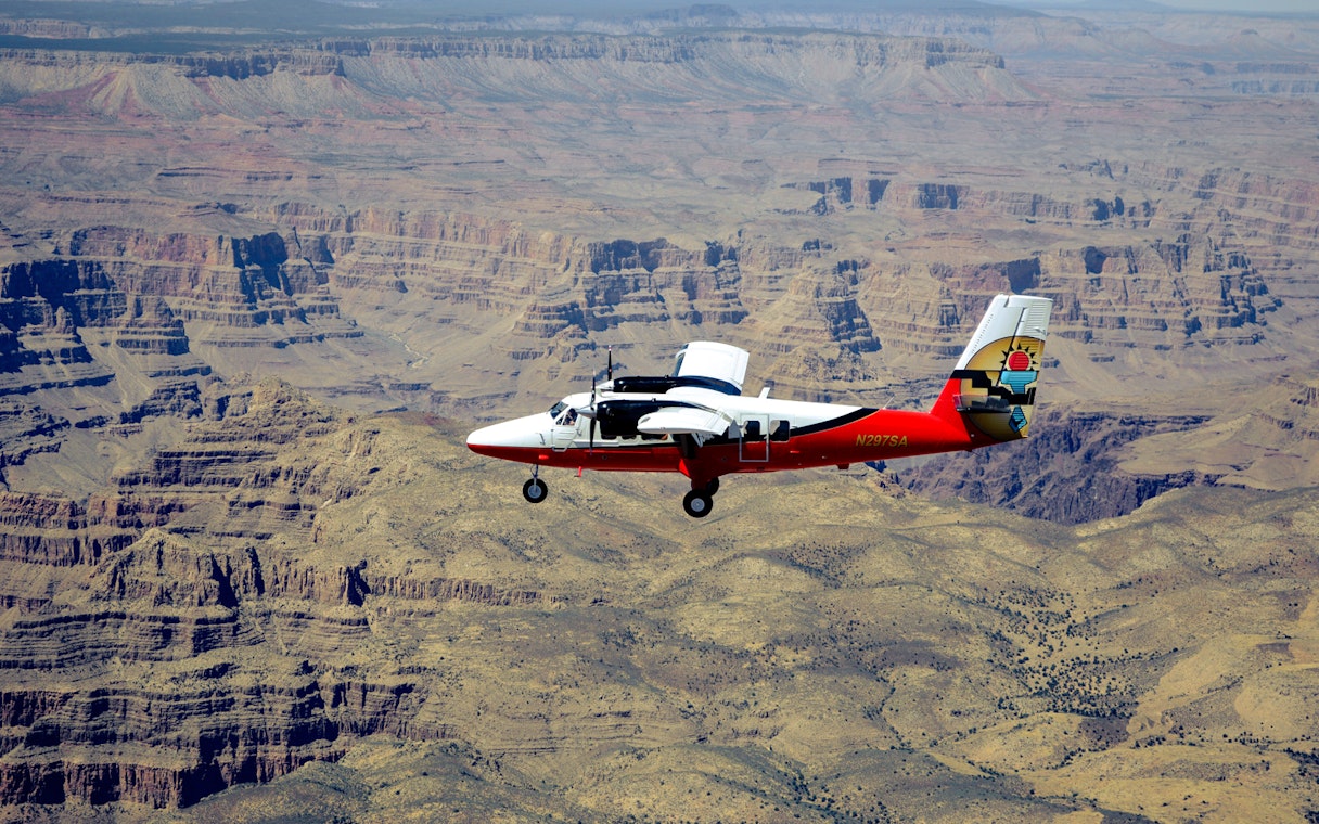 Airplane flying over the Grand Canyon during Las Vegas to Grand Canyon National Park tour.