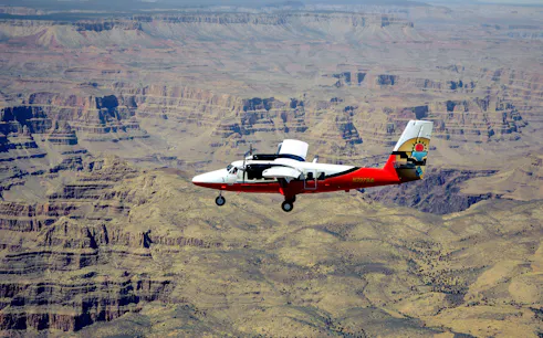 Airplane flying over the Grand Canyon during Las Vegas to Grand Canyon National Park tour.