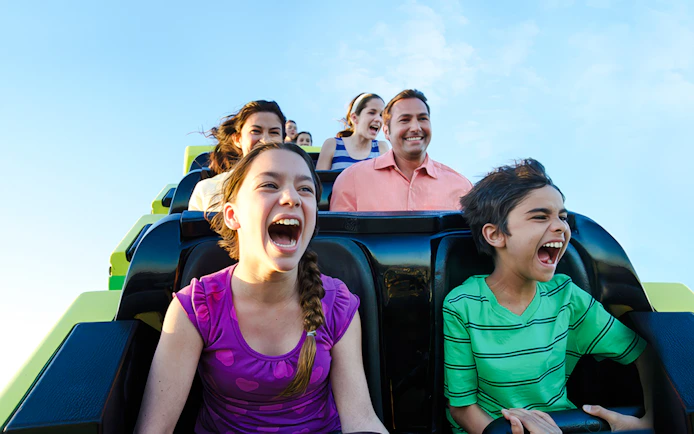 Riders enjoying the Steel Eel roller coaster at SeaWorld San Antonio.
