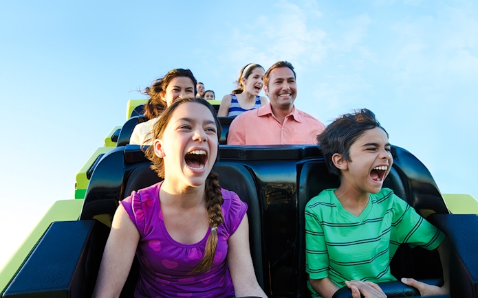 Riders enjoying the Steel Eel roller coaster at SeaWorld San Antonio.