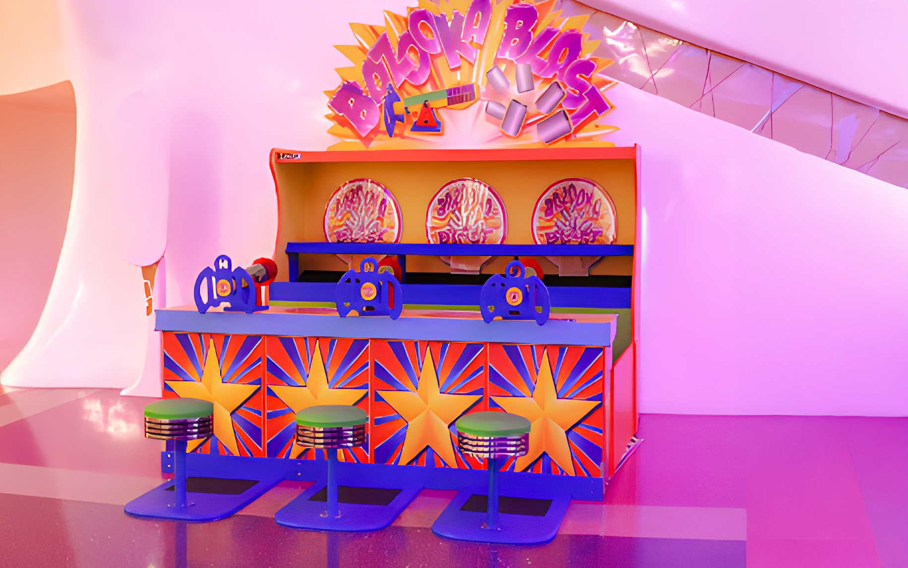 Bazooka Blast game setup at Doha Quest, Qatar with colorful targets and seating.