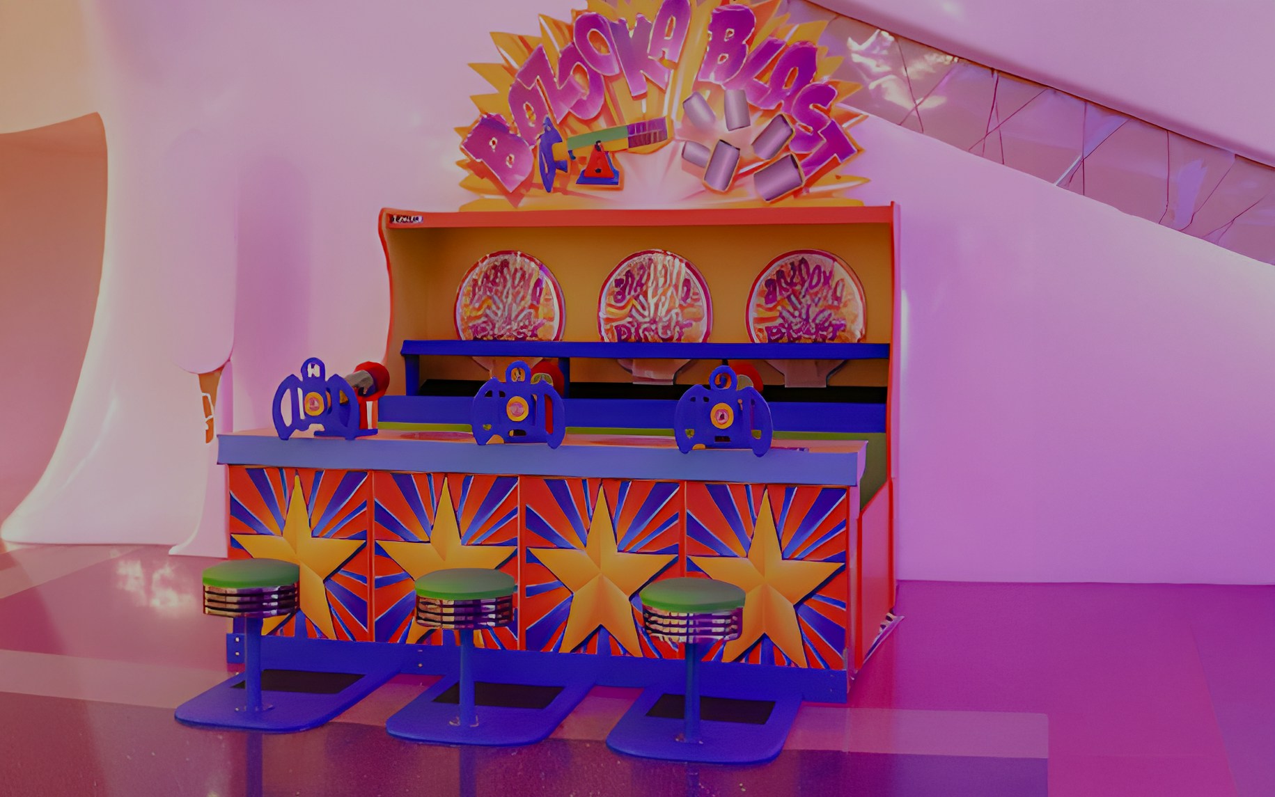 Bazooka Blast game setup at Doha Quest, Qatar with colorful targets and seating.