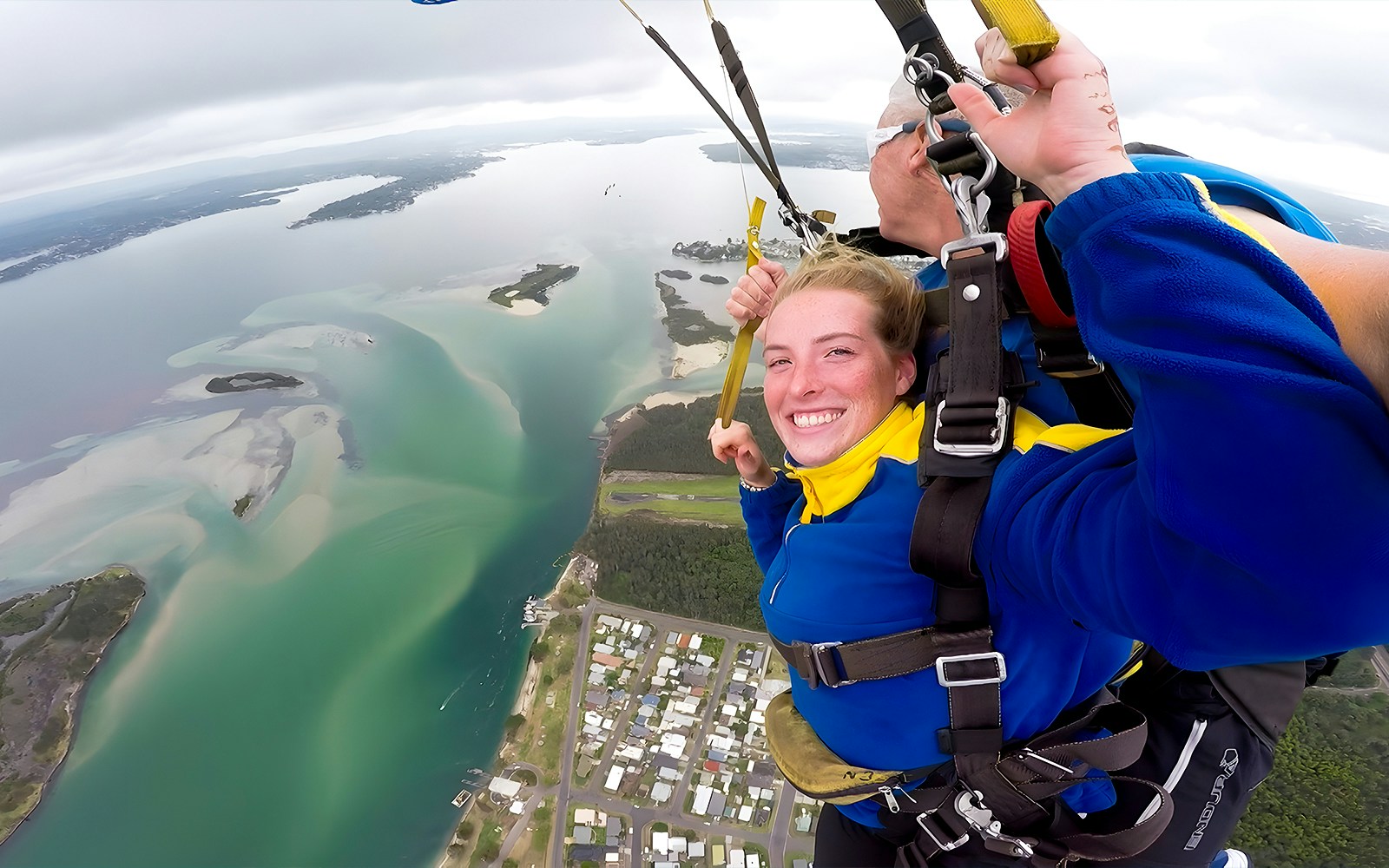 A tourist skydiving over Newcastle, Australia