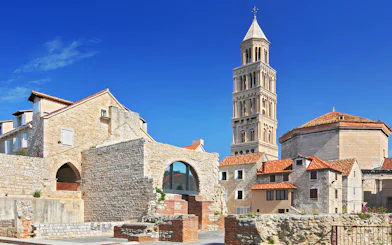 Diocletian's Palace with bell tower in Split, Croatia, showcasing historic architecture.