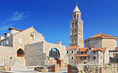 Diocletian's Palace with bell tower in Split, Croatia, showcasing historic architecture.