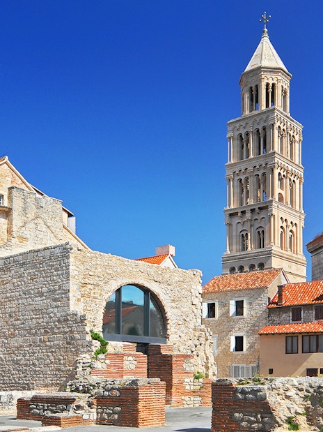Diocletian's Palace with bell tower in Split, Croatia, showcasing historic architecture.