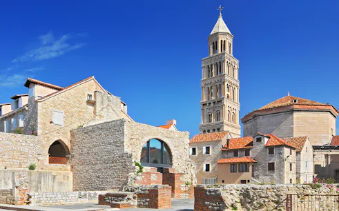 Diocletian's Palace with bell tower in Split, Croatia, showcasing historic architecture.
