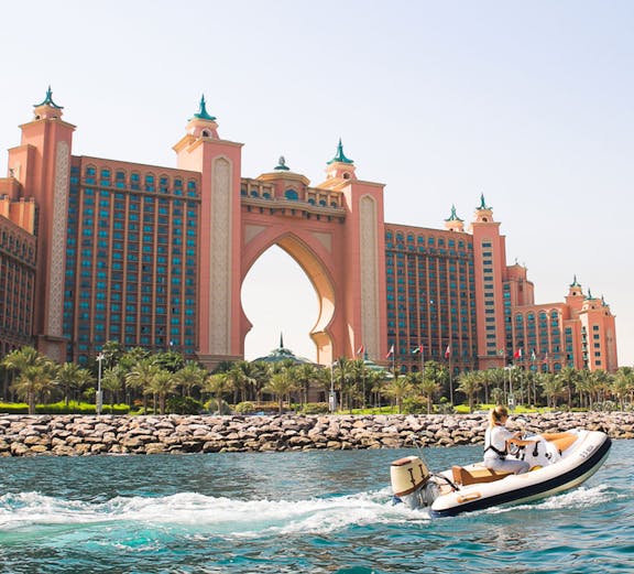 Jet ski in front of Atlantis The Palm, Dubai, during Weekend Bonanza tour.