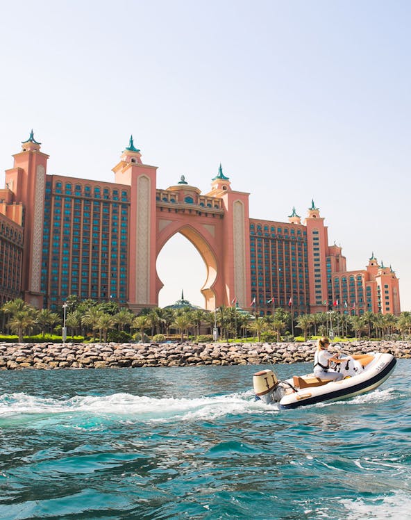 Jet ski in front of Atlantis The Palm, Dubai, during Weekend Bonanza tour.