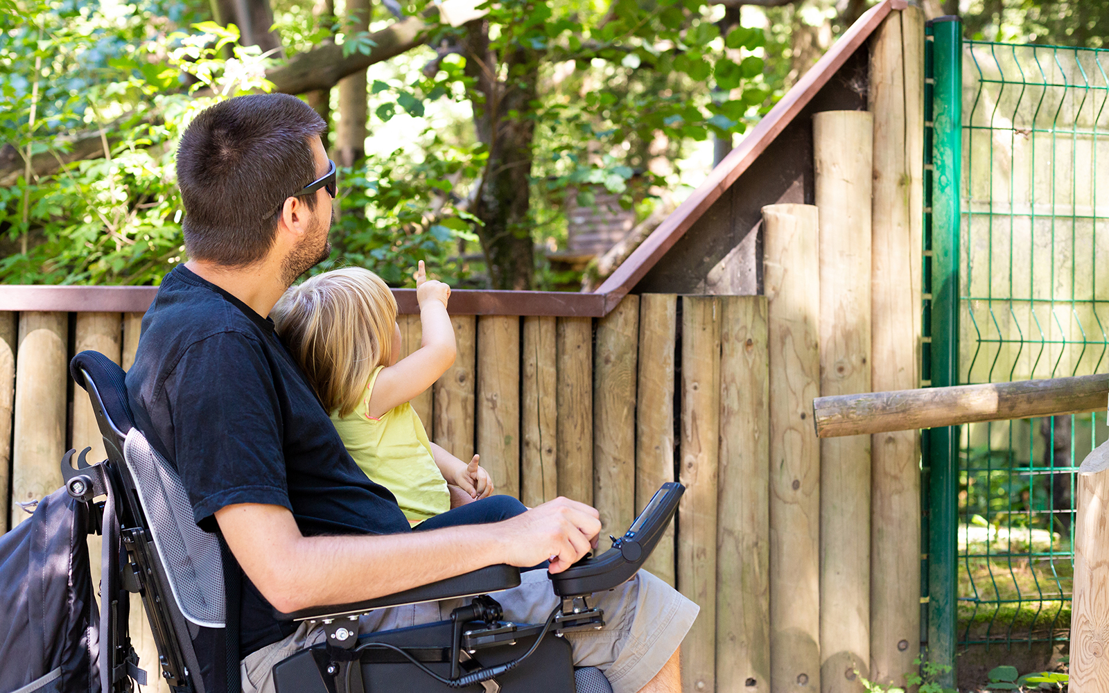 Wheelchair-accessible path in a scenic outdoor park, enhancing inclusive travel experiences.