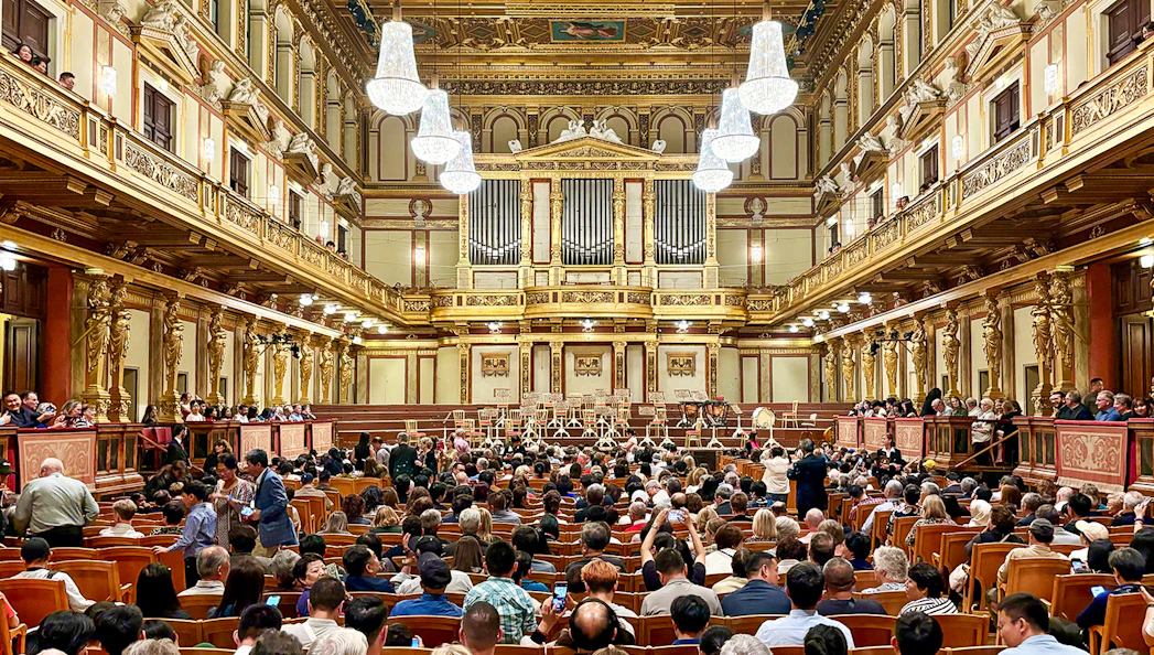 Audience seated in the ornate Musikverein concert hall, Vienna, for Vivaldi and Mozart performance.