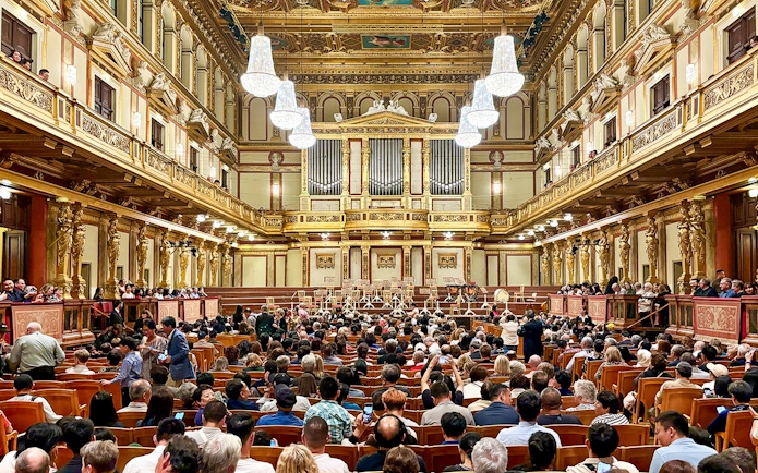 Audience seated in the ornate Musikverein concert hall, Vienna, for Vivaldi and Mozart performance.