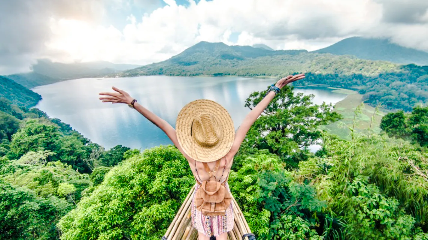 Traveler overlooking Lake Buyan from a viewpoint in North Bali.