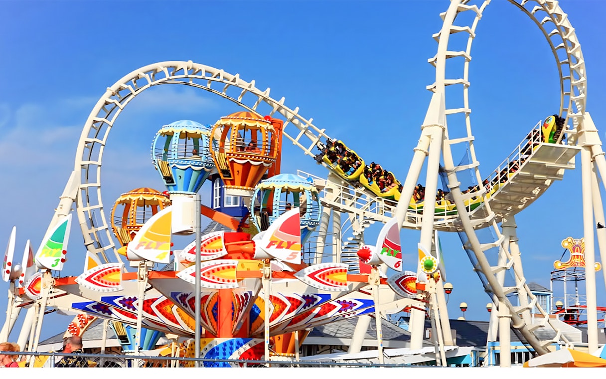 Roller coaster and colorful rides at Dream World Bangkok.