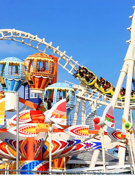 Roller coaster and colorful rides at Dream World Bangkok.