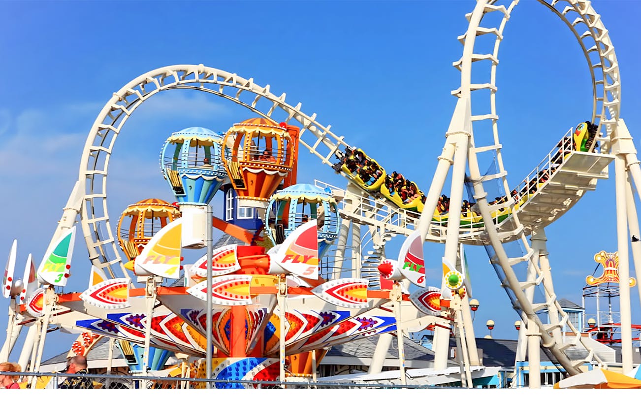 Roller coaster and colorful rides at Dream World Bangkok.