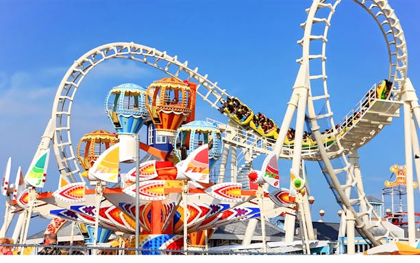 Roller coaster and colorful rides at Dream World Bangkok.
