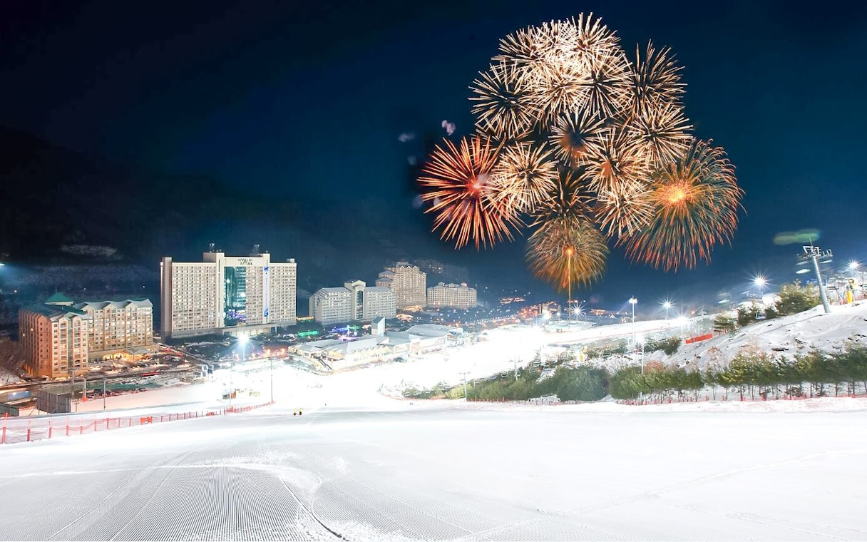 Fireworks display over Vivaldi Park Ski World at night.