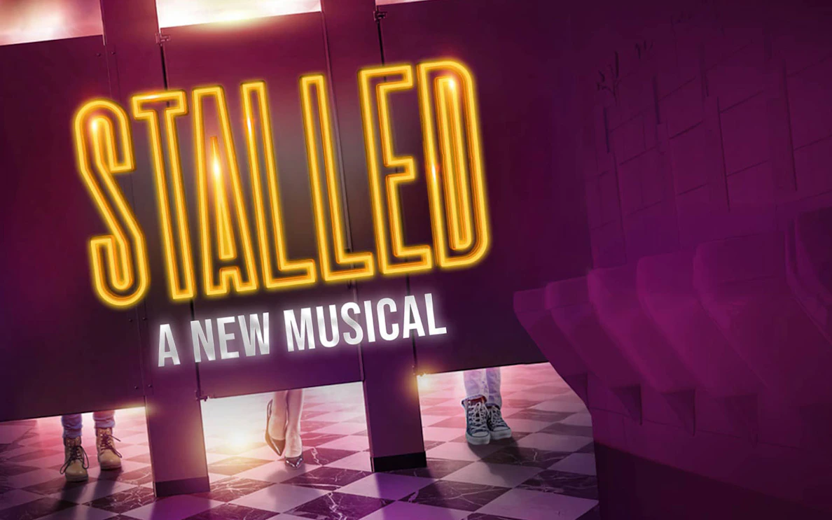 Stalled musical poster with restroom stalls and shoes visible underneath.