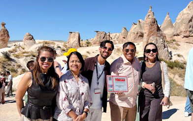 Tour group at Zelve Valley rock formations, Cappadocia, during the Red Tour.