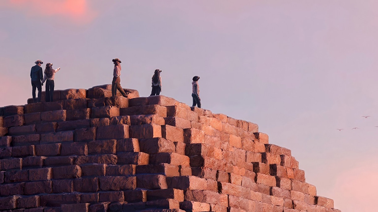 Visitors wearing VR headsets on a pyramid, experiencing Horizon of Khufu virtual reality tour.