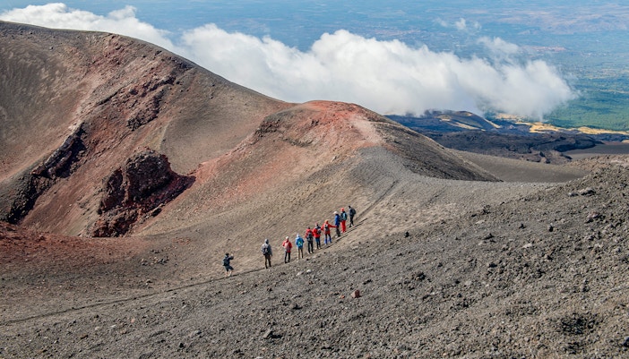 Tourist at Mount Etna's Craters tour
