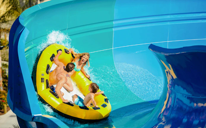 Group enjoying a water slide ride at Knott's Soak City.