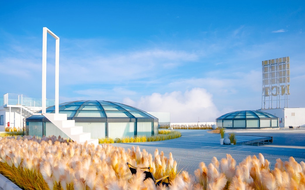 Rooftop view of Hoverland at Wyndham Ion Majestic Hotel, Genting Highlands with glass domes and sky.