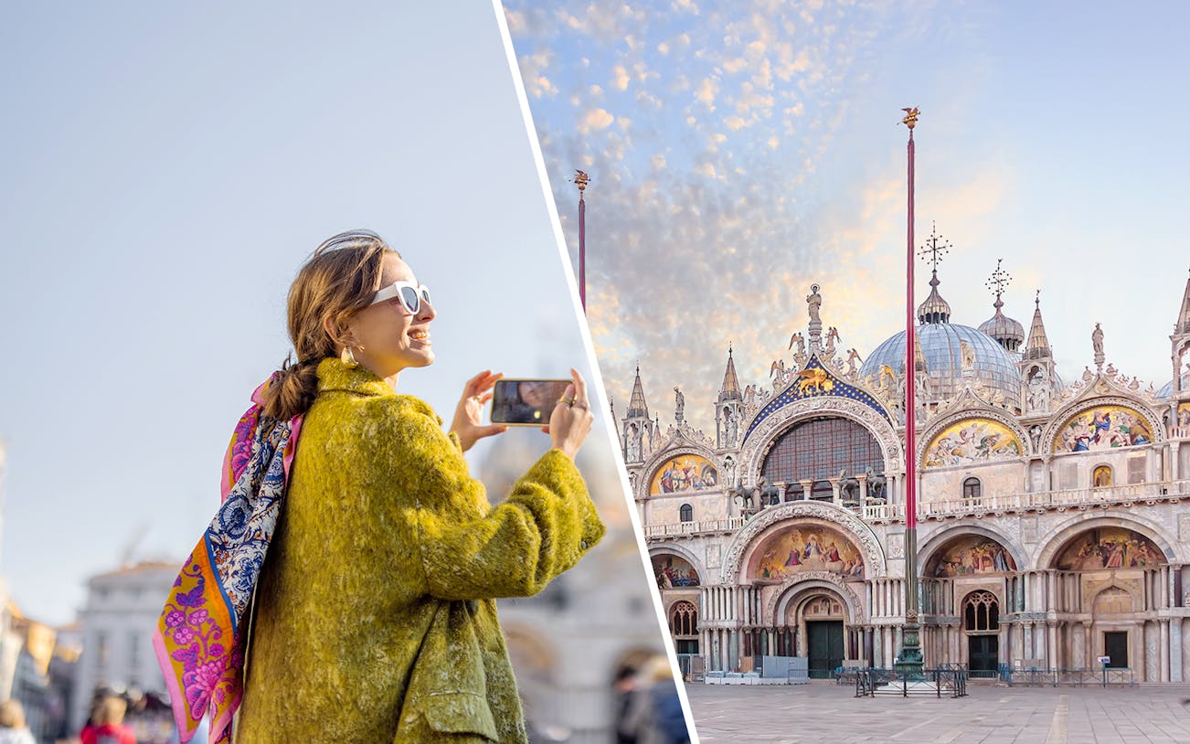 Tourist photographing St. Mark's Basilica in Venice, Italy.
