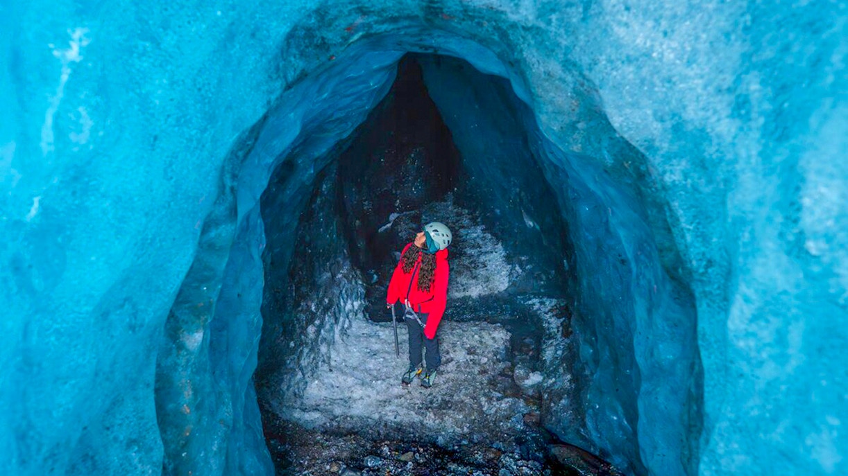 Guests exploring inside Blue Ice Cave in Vatnajökull, Iceland.